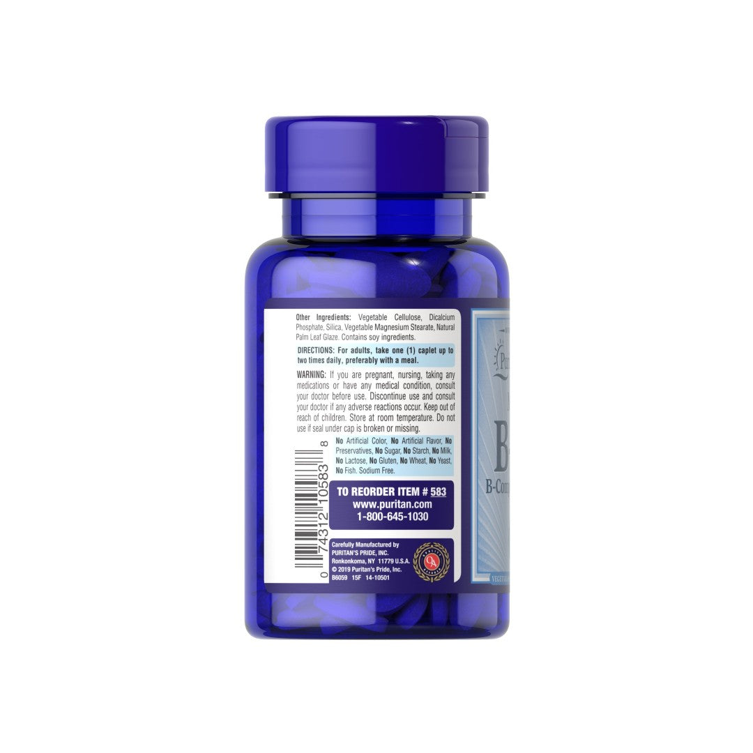 A bottle of Vitamin B-50 Complex 100 Coated Caplets with a Puritan's Pride label on it, promoting cardiovascular health.