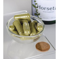 Miniatura di Swanson's Horsetail - 500 mg 90 capsule in una ciotola accanto a una bottiglia di Swanson's horsetail.