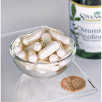Miniatura di Swanson's Chromium Picolinate - 200 mcg 100 capsule in una ciotola accanto a un penny.