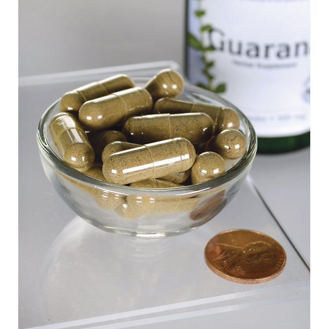 Swanson Guaranà - 500 mg 100 capsule in una ciotola accanto a una bottiglia.