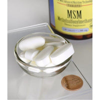 Miniatura per Swanson's MSM - 1.500 mg 120 compresse con proprietà antinfiammatorie in una ciotola accanto a un penny.