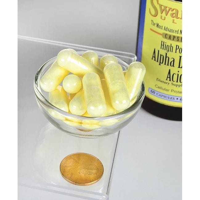 Un flacone di Acido alfa lipoico Swanson - 600 mg 60 capsule con accanto una moneta.
